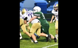 OWEN MURRAY (#52) takes down the Eagles ball carrier at the line in last Friday’s Homecoming game