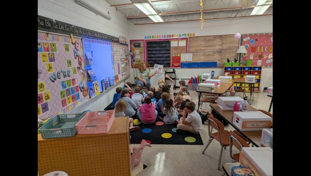 Central Elementary Students, gather for reading time on their First Day of School.