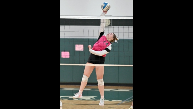 Kailee rugenstein (#14) goes for a kill earlier this season. She had 8 kills and 18 digs last Wednesday against Bullock Creek.