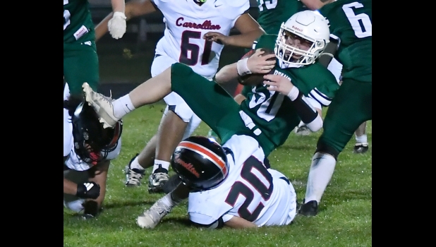 NOAH FOCO (#50) was tripped up on the kick return during Friday’s loss to Carrollton.