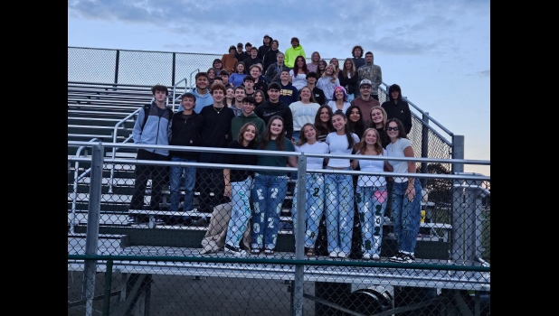 Members of the 2026/2027 Senior Class, gathered on the Football Field bleachers to enjoy pictures and donuts as they watched the sunrise on their Last, First Day of School.