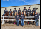 Pinconning Equestrian Team -- Standing (l to r) Head Coach Kari Peckham, Assistant Coach Audrey Karnes, and Assistant Coach Kim Yonke. Back row (l to r) Hanna Havercamp (Junior), riding Norma, Ashlyn Kloha (Freshman) riding Rose, Waylen Kowalczyk (Freshman) riding Twinkie, Haleigh Havercamp (Freshman) riding Sprocket, Logan Peckham (Junior) riding Hemi, Carys VanPollelen (Freshman) riding Casper, Jacob Yonke (Sophomore) riding Trixie. Team Trophy is shown left.