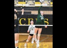 ADRIANNE RAU (#12) tries for the easy tip over the net against Bullock Creek last Wednesday.