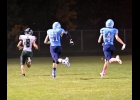 ANTHONY CHARBONNEAU (#8) motors into the end zone on a kickoff return against Meridian on Friday night. Charbonneau scored 8 of the Spartans 14 points and helped set up the other TD.					 --Journal Photo