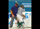 ARIEL HOLSTINE (#12) faces down the Gladwin pitcher last Thursday. --Journal Photo