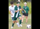 ASHTON ENCISO (#2) carries the ball up against Hemlock on Friday.
