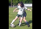 AUBREE BISHOP (#16) takes a free kick that set up the Spartans second-half goal by KacieRae Krevinghaus in last Tuesday’s District Semi-Final match against Ithaca at Houghton Lake. --Journal Photo