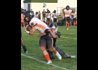 AYDEN LALONDE (#21) Drags down the Indian runner for 1 of his 3 tackles in Friday Night’s game against Chesaning. --Journal Photo