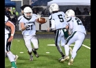 AYDEN LALONDE (#21) gets the pitch on the reverse on his way to a nice gain against Meridian in the Spartans’ Friday loss to the Mustangs. --Journal Photo