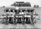 This happy crew of vegetable farmers are hard at work transplanting peppers! Henry Hribek in the tractor pulling the transplanter with the “planters” L to R: Mary Jane Hribek, unknown, unknown, Ronnie Hribek, Vivian O’Laughlin, unknown, Judy Monsion and Betty Monsion. Circa 1970’s --Journal Archive Photo