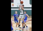 BRADEN SLOWINSKI (#4) takes a jumper against Harrison on Wednesday. Hornets held him scoreless through the evening. --Journal Photo