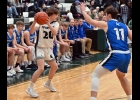 BRADY LUPKE (#20) moves the ball early in Wednesday’s District 71-3 Semi-Final action. Pinny fell to the Beal City 33-46. --Journal Photo