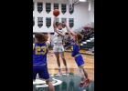 BRADY LUPKE (#2) led the Spartans with 13 points in their win over the Hornets. --Journal Photo