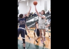 BRADY LUPKE (#2, above right) led the Spartans in scoring in both games this week with 16 against SASA and 18 versus Gladwin. --Journal Photo