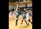BRIELLE HERNER (#10) goes up for 2 of her 8 points against the Bluejays in the Spartans Thursday night, 33-58 loss. --Journal Photo