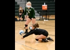 BROOKE LAVRACK (#6) goes for a dig as Alaina Backus (#5) looks on in last Thursday’s 3-0 win against Carrollton. --Journal Photo