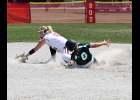 BROOKE LAVRACK (#6) slides in safe at second when Lexi Holstine grounded to the Tawas first baseman who made the fielder’s choice play to second that went wrong. --Journal Photo