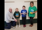 ROTARY MEMBER and Superintendent Andy Kowalczyk with (left to right) Jordan -- Courtesy Photo ROTARIANS NATE PEPPLE AND DAVE TOKARSKY are pictured with the 3rd and 4th graders and Linwood Elementary School with their brand new dictionaries and thesauruses. --Courtesy Photos Socia, Daniel Neely and Rotarian Lori Schumann.