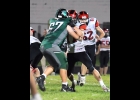 CALVIN HOLLAND (#67) works his defender in Friday’s game against Beaverton. --Journal Photo