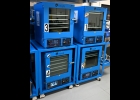A RACK OF VACUUM OVENS at Cannalicious Labs allows employees to specify a certain temperature and vacuum level to evaporate process chemicals more efficiently during the THC extraction process. --Journal Photo
