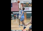 CARSON PARKS (#12) gets away a jumper from the line in the Spartan’s loss to Meridian.    --Journal Photo