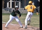 CARTER BLESHENSKI (#24) makes the out at first on the Western batter during the Spartan’s Sunday Bay County Tournament game at John Glenn. 								               --Journal Photo