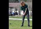 CARTER COUTCHER of the Spartan Varsity Boys Golf Team tees off on a practice round.    					         --Journal Photo