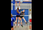CHLOE DROUSE (#4) gets one of her 5 kills against Gladwin last Wednesday. The Flying G’s topped the Spartans in 3 straight sets.   