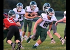 COOPER NORMAN (#44) takes the hand-off from Spartan QB Thaddeus Nashatka during Friday’s Beaverton game. Norman led Pinconning’s rushers with 61 yards on 15 carries. --Journal Photo