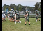 THE SPARTAN DEFENSIVE Line lines up to oppose an early extra-point attempt in their game against Gladwin on Friday night. --Journal Photo