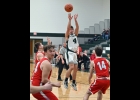 DJ LABEAN (#4) led all scorers in Monday’s District win with 19 points. --Journal Photo
