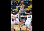 DAILYN BAYNE (#10, above) takes a shot last Monday at Bullock Creek. --Journal Photo