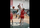 Danny Dubay (#0) drives the key through the Beavers block for a shot late in the Spartans’ 2-point loss to Beaverton last Wednesday night.