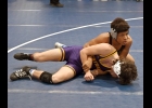 DARIUS COOPER looks up as his coach shouts instructions during his first of three matches on Saturday. He pinned opponents from Bay City Central, Western, and John Glenn to claim the Bay County Championship at 152 pounds. --Journal Photo