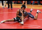 DARRIUS COOPER (top right) took just 48 seconds to pin his opponent from Mt Morris last Wednesday. --Journal Photo