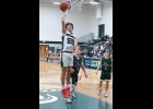 DAYNE IVEY (#55) goes in for a late layup against Clare last Thursday. --Journal Photo