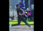 ELLA HUNTER (#4) punches a grounder in last Tuesday second game against the Shepherd Bluejays.