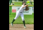 EMILY BREZA (#7) knocked down this grounder and got the out at first base in the first game against Gladwin on Friday.