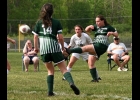 EMILY VANHORN (#24) took a corner kick from Maddy Brady (#8) settled it, and sent it over the crowd in front to score the Spartan’s first goal of the season against Gladwin last Thursday. --Journal Photo