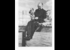 Father George J. Gougeon, 6th Pastor of St. Michael Church in Pinconning. This photo was sent to the Journal by Sally DeYoung, a subscriber from Prescott Valley, AZ.  She found the photo in an album belonging to her husbands grandmother. She also wondered if anyone knew who the little boy was or where the photo may have been taken.             --Courtesy Photo