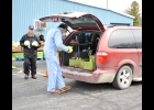 PINCONNING AREA EMERGENCY FOOD PANTRY VOLUNTEERS fill up the back of a van during their Food Distribution on April 17th. The next Food Distributions will be May 1st and May 15th at 11 am at the K of C Hall. --Journal Photo by Kayla Dybas