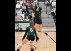 GEENA GAUTHIER (#7, top right) sends the ball back to Shepherd on Monday night.