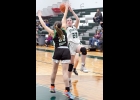 GEENA GAUTHIER (#22) drives to the lane to get a shot away against Houghton Lake in Monday’s loss to the Bobcats. --Journal Photo