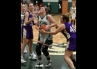 GEENA GAUTHIER (#22) tries to fight off a Farwell player to make a shot in Wednesday’s loss to the Eagles. --Journal Photo