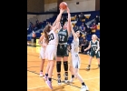 GEENA GAUTHIER (#22) battles three Bluejay players for a rebound in Friday night action at Shepherd. --Journal Photo
