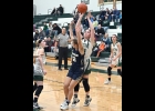 GEENA GAUTHIER (#22) takes a shot after grabbing a rebound against Shepherd last Thursday. --Journal Photo