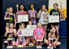 PINNY YOUTH WRESTLING GIRLS brought home the trophies from the NEMWA Girls State Championships on February 7th. Front Row (l-r): Harper Havercamp, Abby Bradley, Everest Thomas, Stormy Walton, Maycee Basner. Back Row: Brooklyn Havercamp, Mari Thomas, Allure Foor, Amalia Richard, Haleigh Havercamp. See article for awards.