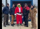 PINCONNING GOODFELLOWS MEMBERS Derek Bauer, Mike Bauer, The Grinch, Ben Ramsay, and Payton Ramsay take a break from collecting donations last Saturday.	          		                  --Courtesy Photo