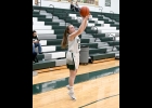 HANNAH FLOYD (#25, above) hits for 3 points in the Spartans 66-28 victory over Whittemore-Prescott on Monday evening. --Journal Photo