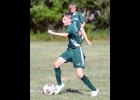 HUNTER GROULX (#4) moves the ball up the pitch in last Wednesday’s game against USA. On Monday, he claimed an assist in the win over Alcona.--Journal Photo